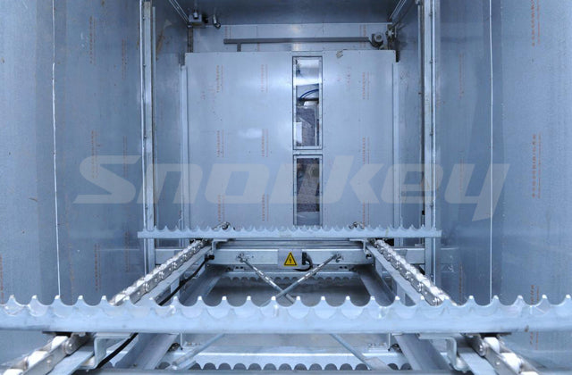 Inside a Snowkey containerised raking ice storage