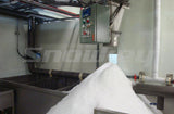 Screw ice storage metering ice outlet